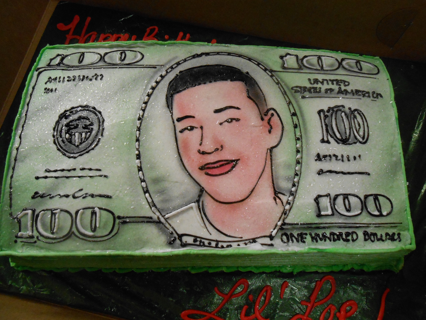 Custom $100 bill cake with hand-drawn portrait
